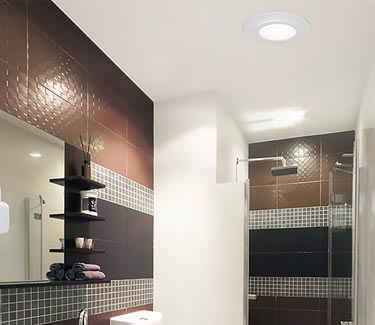 Natural Light tubular skylight vent kit installed in modern bathroom thumb